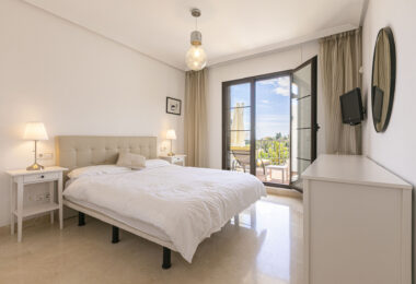 Beautiful south-facing, four bedroom townhouse in Los Almendros, part of the secure Los Arqueros Golf community in Benahavís