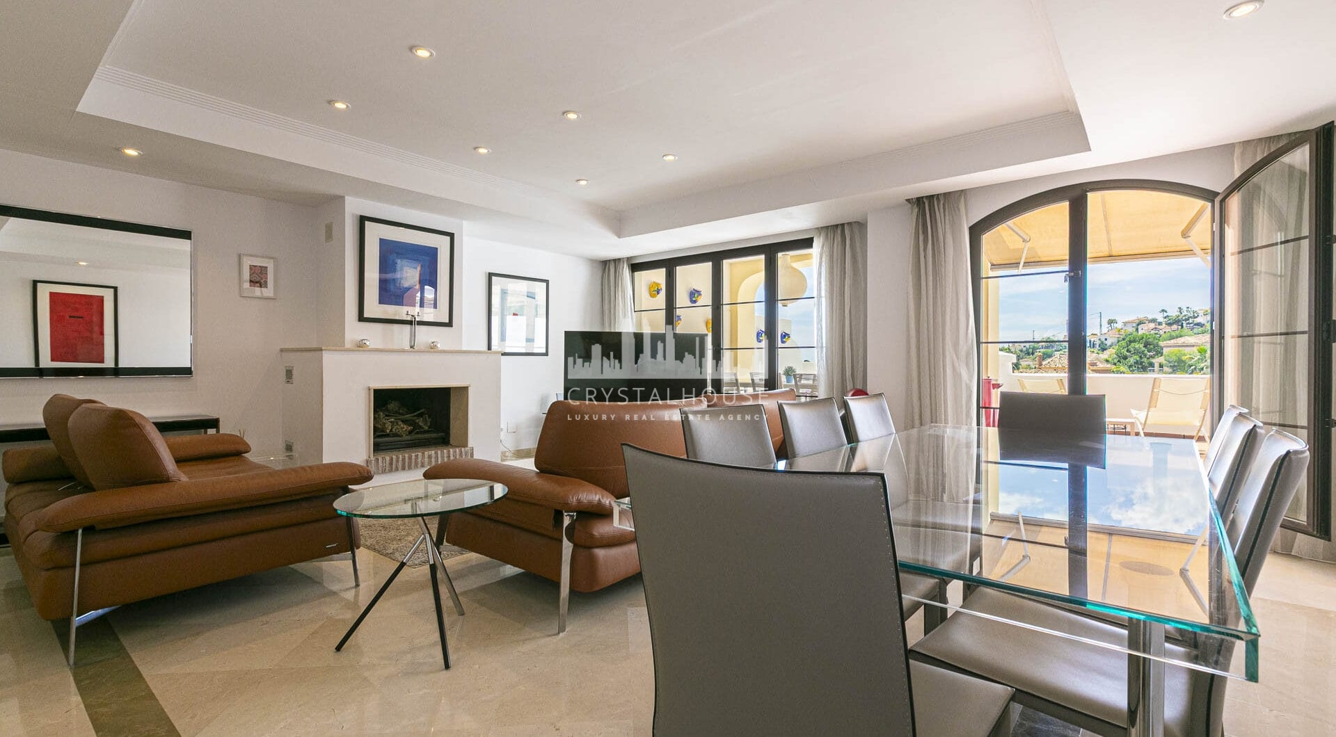 Beautiful south-facing, four bedroom townhouse in Los Almendros, part of the secure Los Arqueros Golf community in Benahavís
