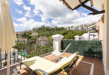 Beautiful south-facing, four bedroom townhouse in Los Almendros, part of the secure Los Arqueros Golf community in Benahavís