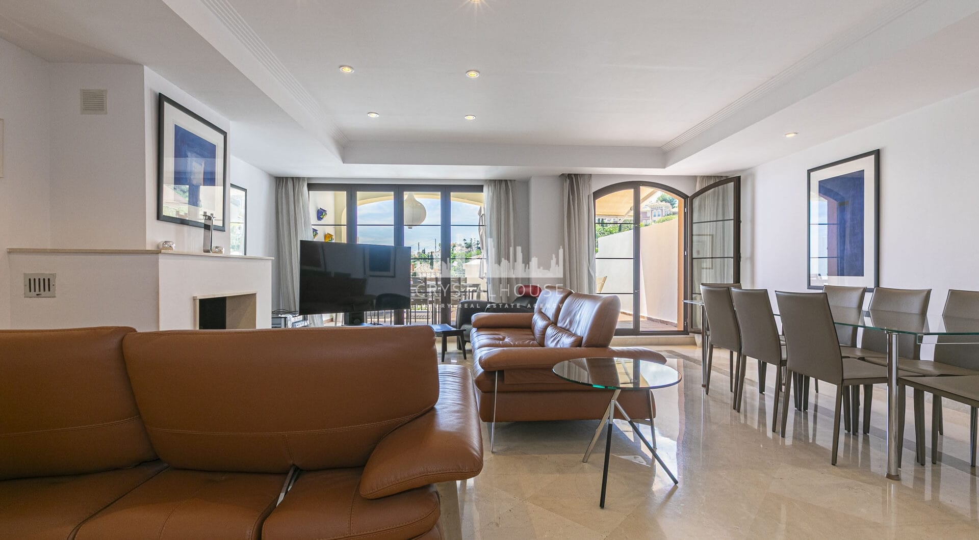 Beautiful south-facing, four bedroom townhouse in Los Almendros, part of the secure Los Arqueros Golf community in Benahavís