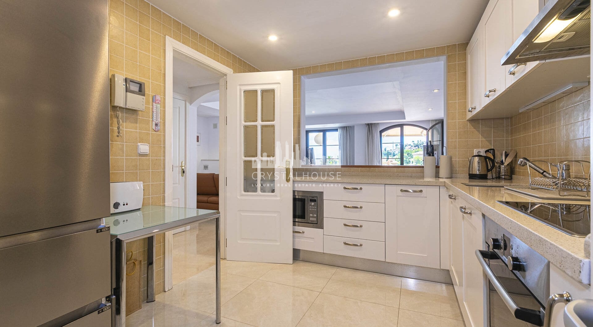 Beautiful south-facing, four bedroom townhouse in Los Almendros, part of the secure Los Arqueros Golf community in Benahavís