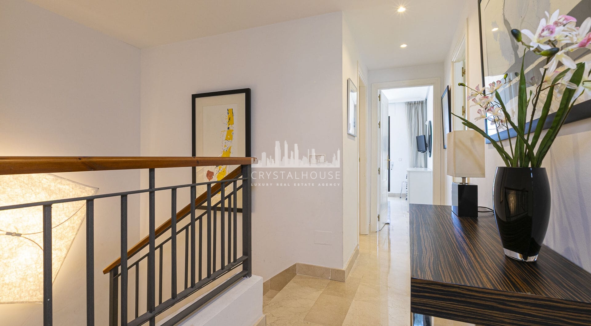 Beautiful south-facing, four bedroom townhouse in Los Almendros, part of the secure Los Arqueros Golf community in Benahavís