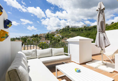 Beautiful south-facing, four bedroom townhouse in Los Almendros, part of the secure Los Arqueros Golf community in Benahavís