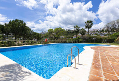 Beautiful south-facing, four bedroom townhouse in Los Almendros, part of the secure Los Arqueros Golf community in Benahavís