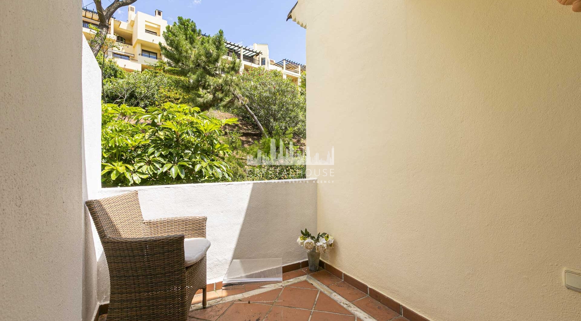Beautiful south-facing, four bedroom townhouse in Los Almendros, part of the secure Los Arqueros Golf community in Benahavís