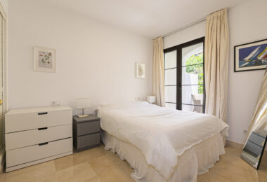 Beautiful south-facing, four bedroom townhouse in Los Almendros, part of the secure Los Arqueros Golf community in Benahavís