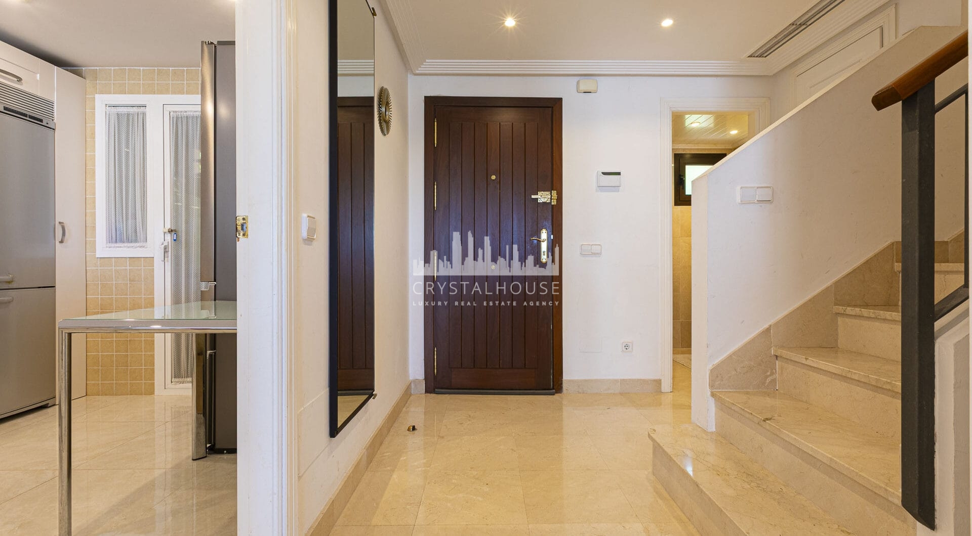 Beautiful south-facing, four bedroom townhouse in Los Almendros, part of the secure Los Arqueros Golf community in Benahavís