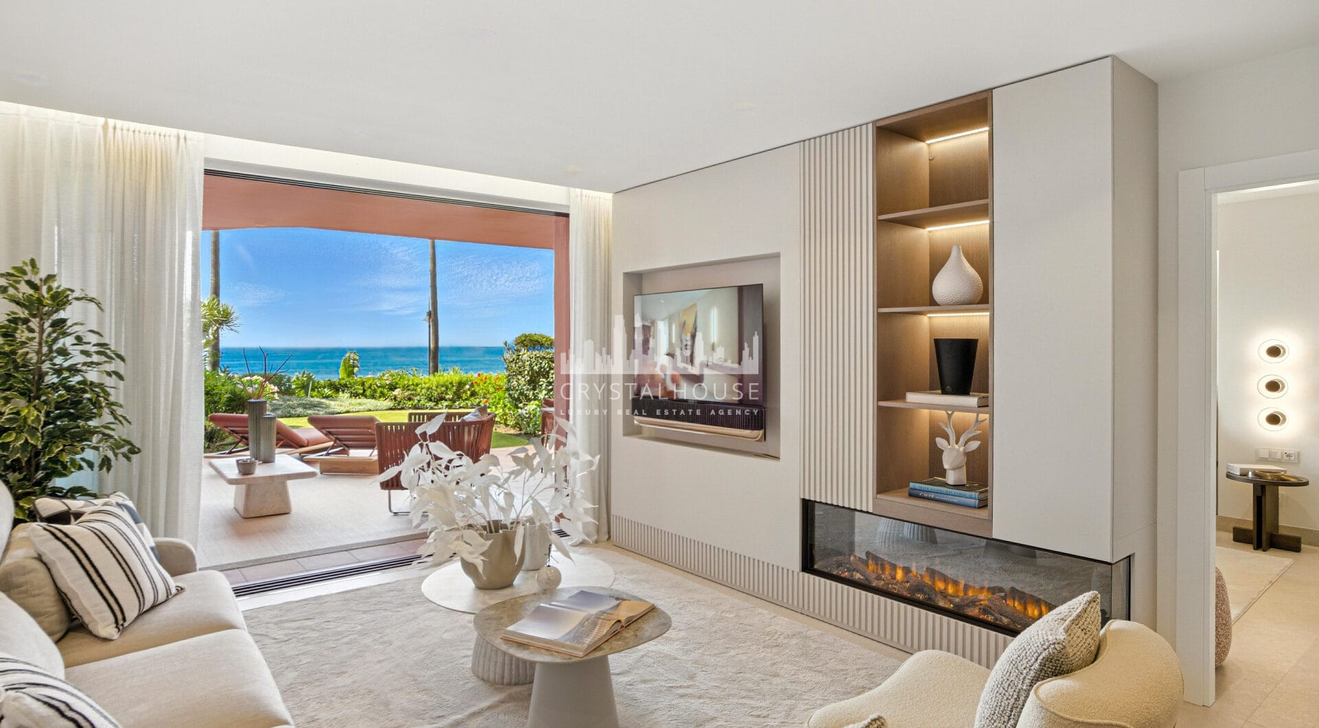 Impeccably renovated, south facing beach front, garden apartment located in the exclusive Menara Beach community on the sought-after New Golden Mile
