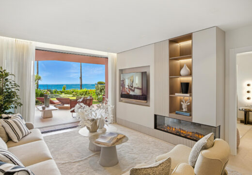 Impeccably renovated, south facing beach front, garden apartment located in the exclusive Menara Beach community on the sought-after New Golden Mile