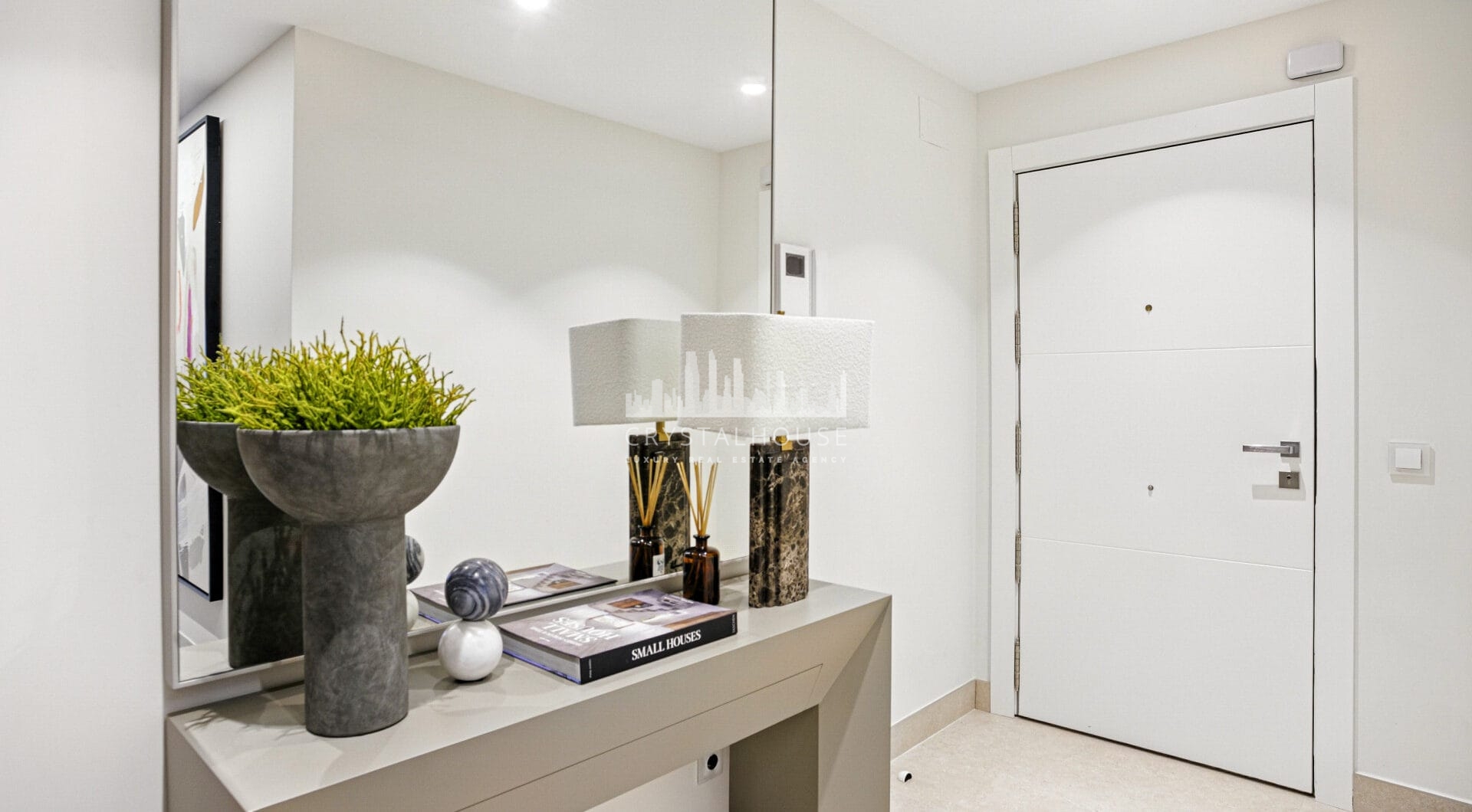 Impeccably renovated, south facing beach front, garden apartment located in the exclusive Menara Beach community on the sought-after New Golden Mile