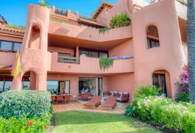 Impeccably renovated, south facing beach front, garden apartment located in the exclusive Menara Beach community on the sought-after New Golden Mile