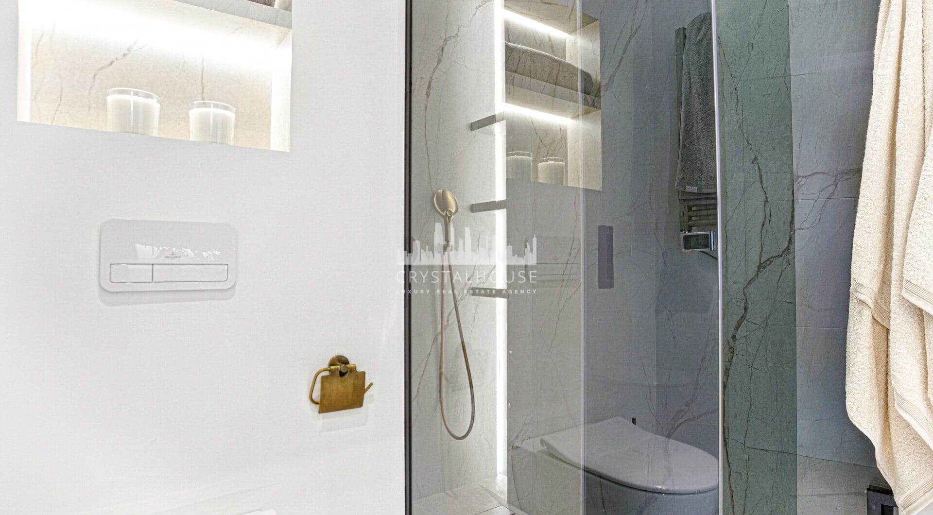 Impeccably renovated, south facing beach front, garden apartment located in the exclusive Menara Beach community on the sought-after New Golden Mile