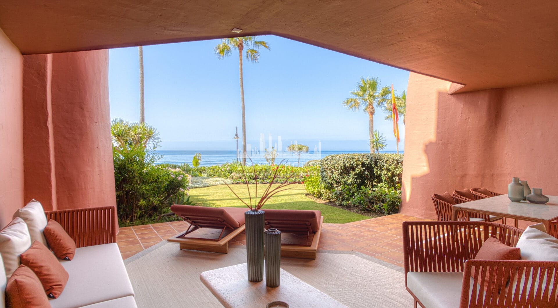 Impeccably renovated, south facing beach front, garden apartment located in the exclusive Menara Beach community on the sought-after New Golden Mile