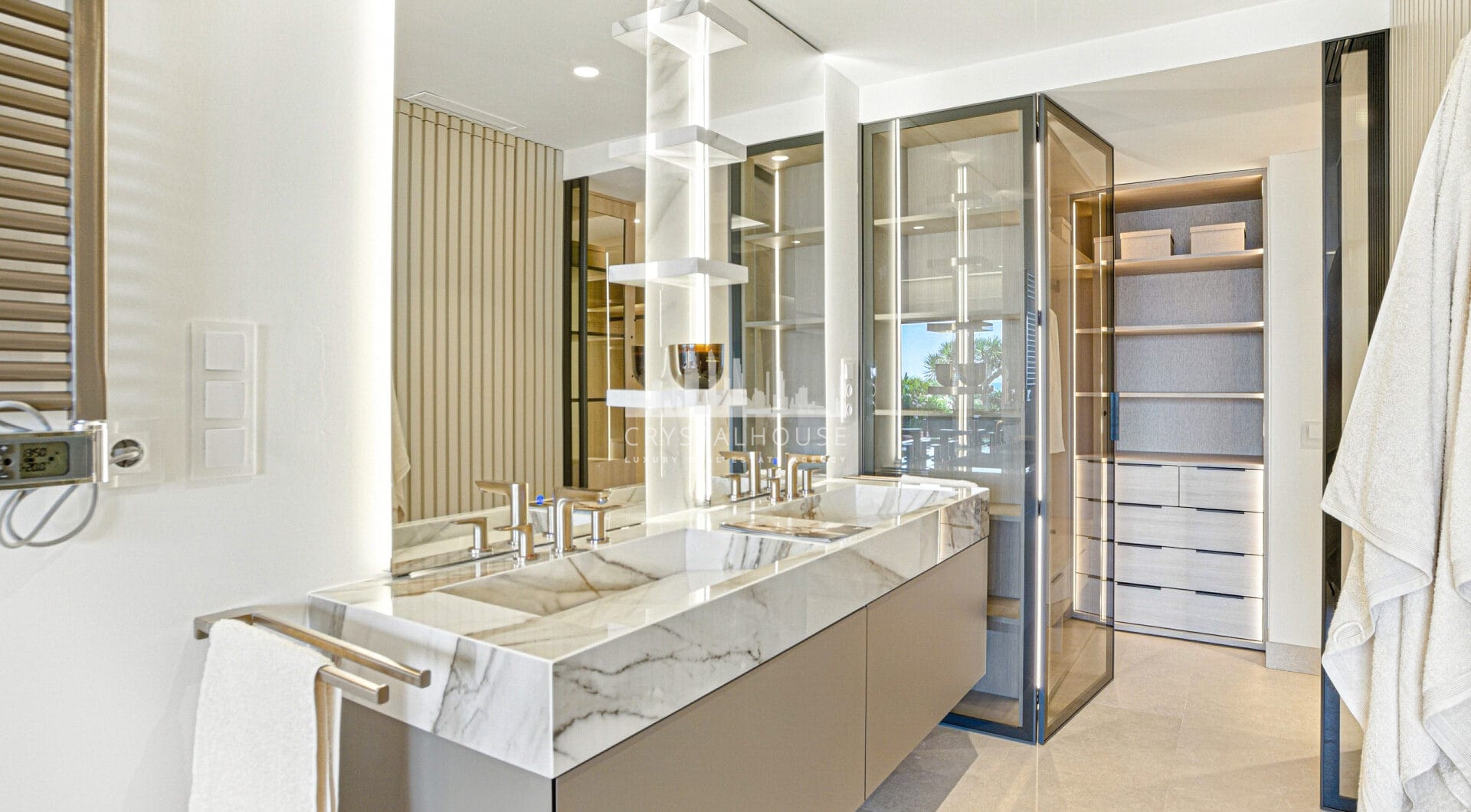 Impeccably renovated, south facing beach front, garden apartment located in the exclusive Menara Beach community on the sought-after New Golden Mile