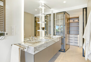 Impeccably renovated, south facing beach front, garden apartment located in the exclusive Menara Beach community on the sought-after New Golden Mile