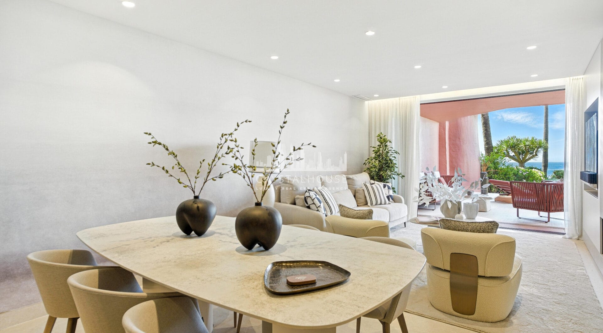 Impeccably renovated, south facing beach front, garden apartment located in the exclusive Menara Beach community on the sought-after New Golden Mile