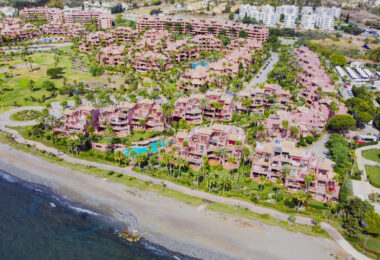 Impeccably renovated, south facing beach front, garden apartment located in the exclusive Menara Beach community on the sought-after New Golden Mile