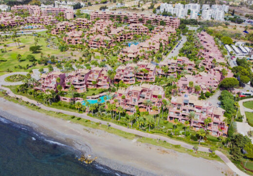 Impeccably renovated, south facing beach front, garden apartment located in the exclusive Menara Beach community on the sought-after New Golden Mile