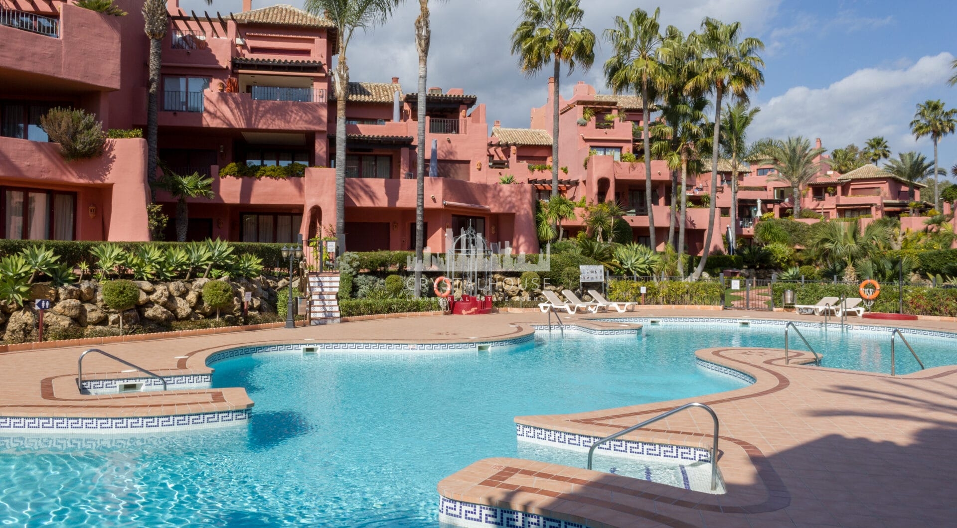 Impeccably renovated, south facing beach front, garden apartment located in the exclusive Menara Beach community on the sought-after New Golden Mile
