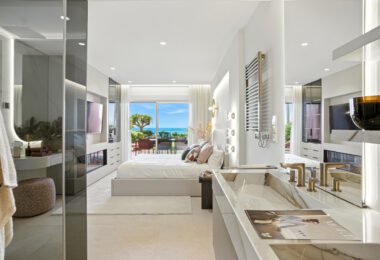 Impeccably renovated, south facing beach front, garden apartment located in the exclusive Menara Beach community on the sought-after New Golden Mile