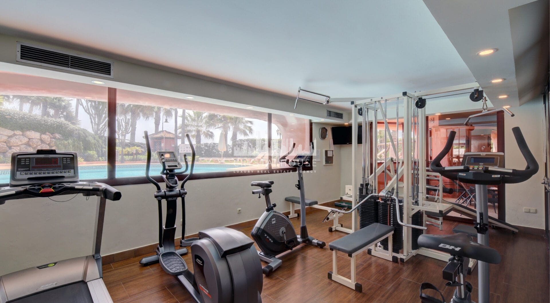 Impeccably renovated, south facing beach front, garden apartment located in the exclusive Menara Beach community on the sought-after New Golden Mile