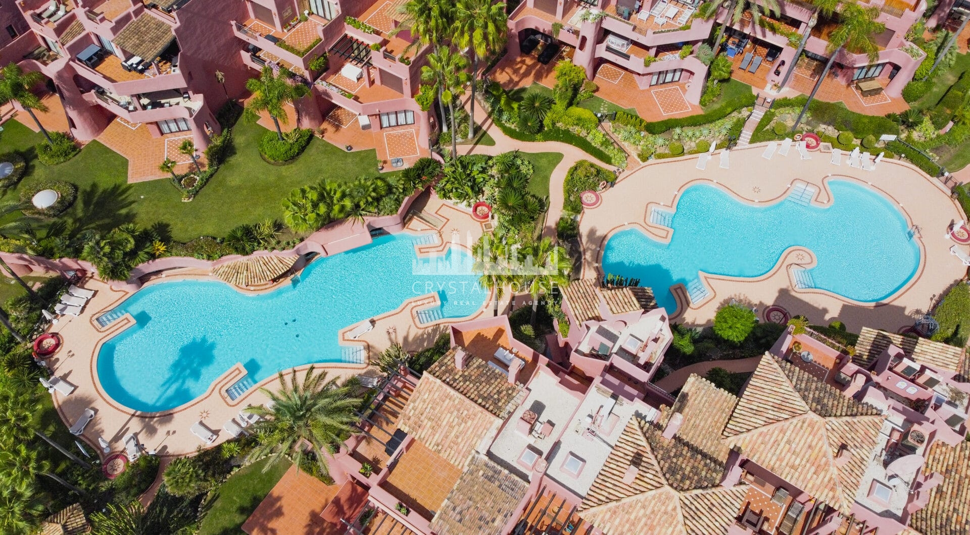 Impeccably renovated, south facing beach front, garden apartment located in the exclusive Menara Beach community on the sought-after New Golden Mile