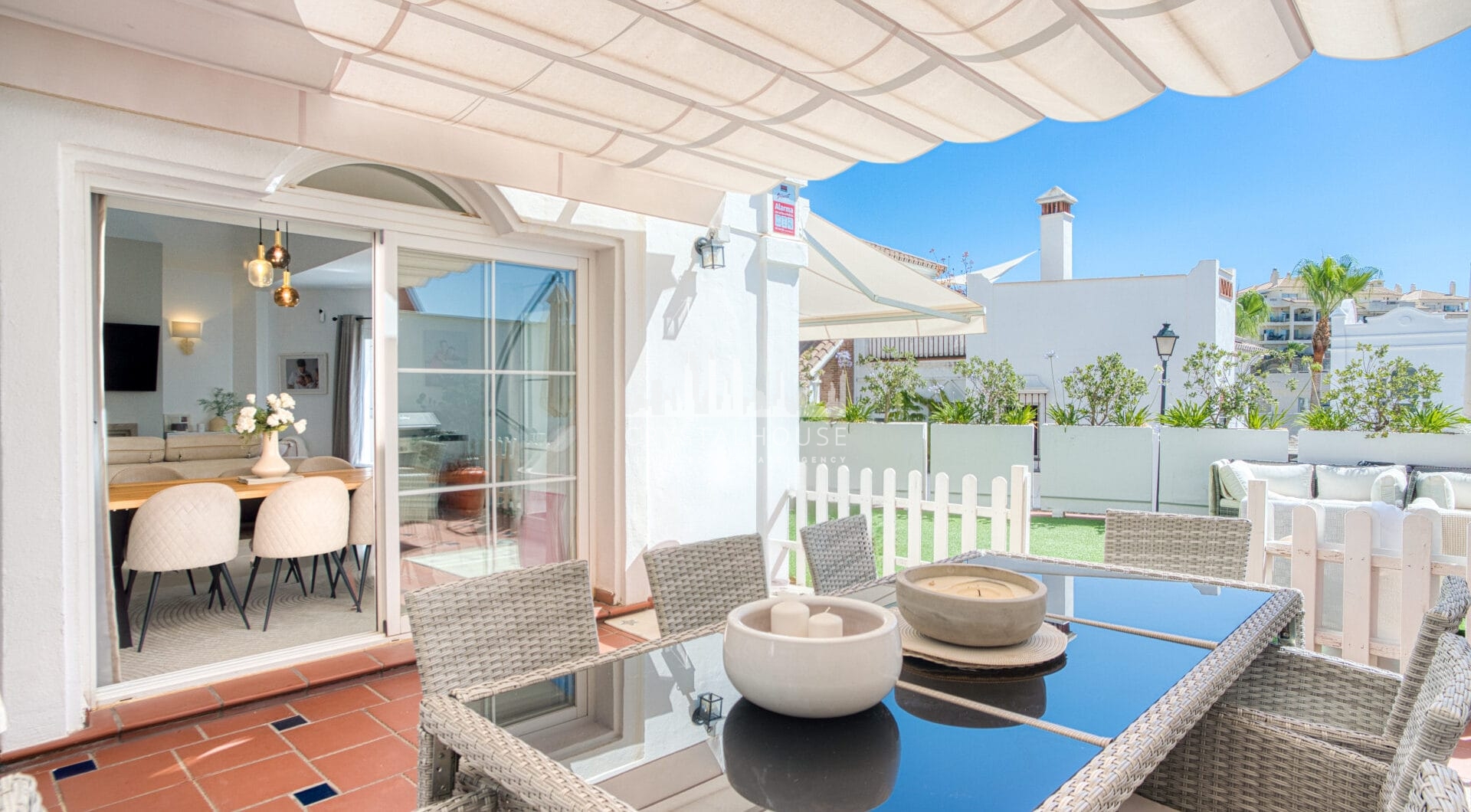 Stylish south west facing, three-bedroom semi detached townhouse located in Riviera del Sol