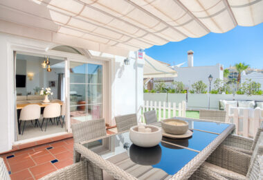 Stylish south west facing, three-bedroom semi detached townhouse located in Riviera del Sol