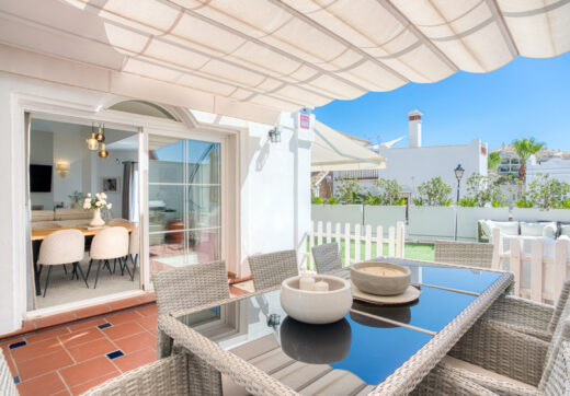 Stylish south west facing, three-bedroom semi detached townhouse located in Riviera del Sol