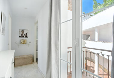 Stylish south west facing, three-bedroom semi detached townhouse located in Riviera del Sol