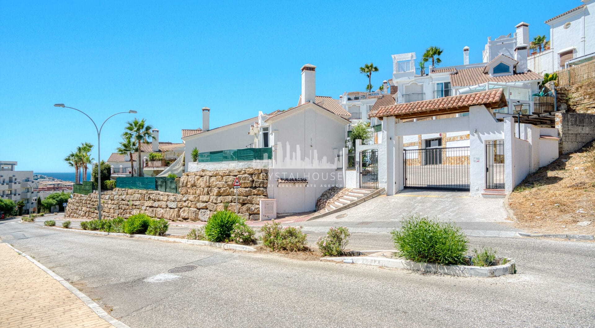 Stylish south west facing, three-bedroom semi detached townhouse located in Riviera del Sol
