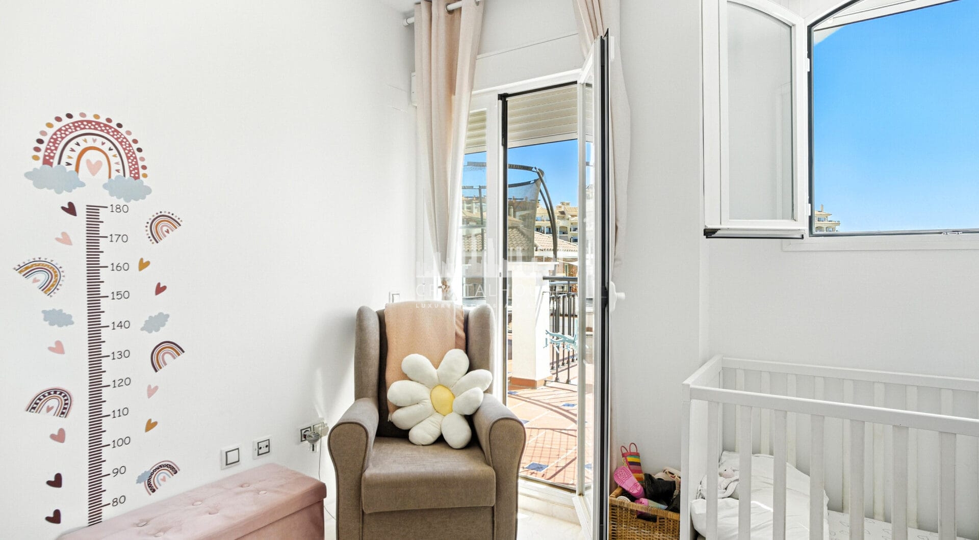 Stylish south west facing, three-bedroom semi detached townhouse located in Riviera del Sol