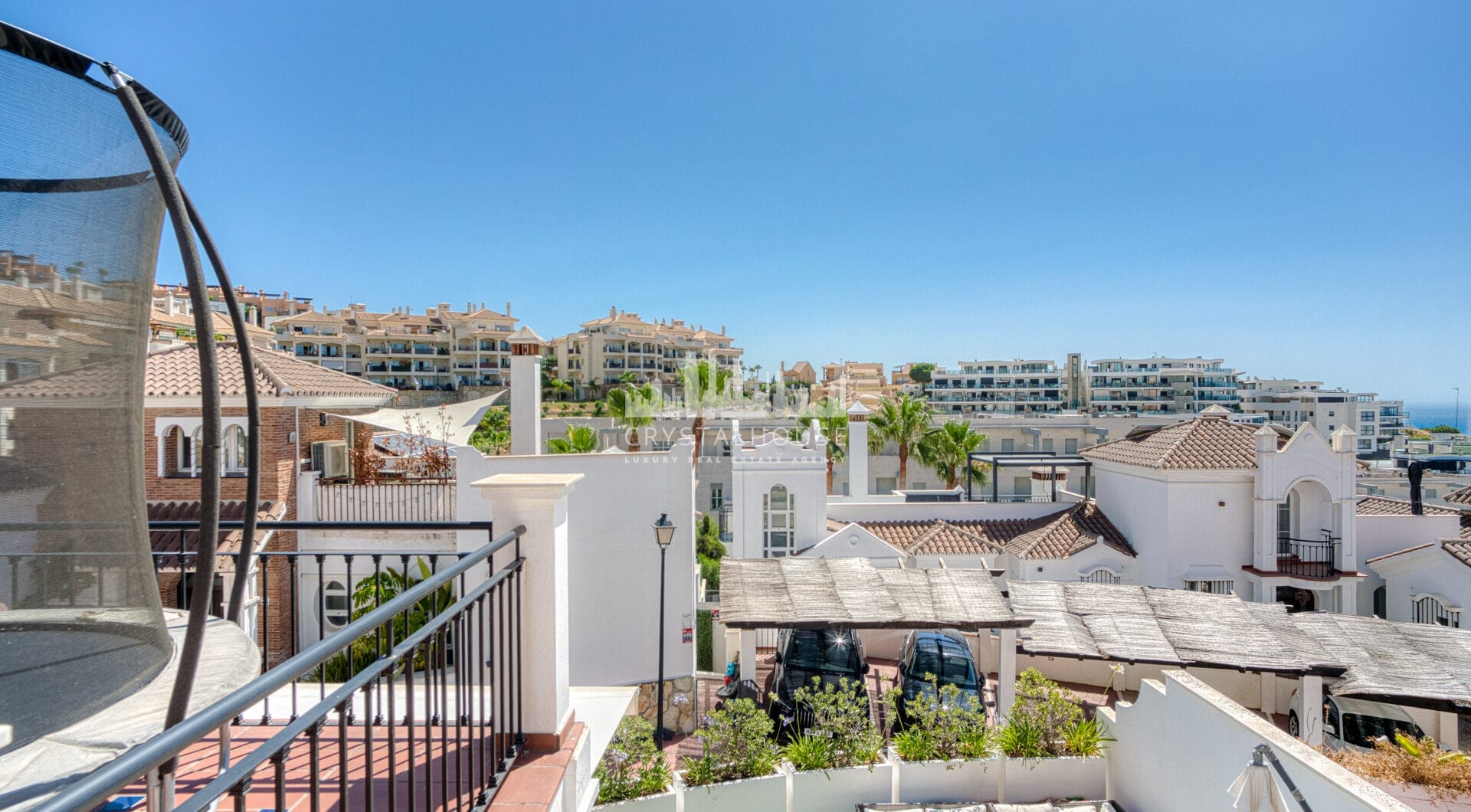 Stylish south west facing, three-bedroom semi detached townhouse located in Riviera del Sol