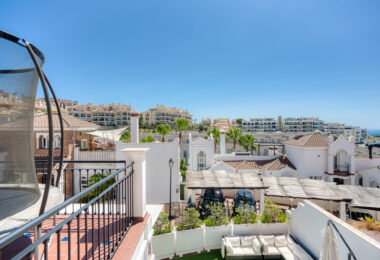 Stylish south west facing, three-bedroom semi detached townhouse located in Riviera del Sol