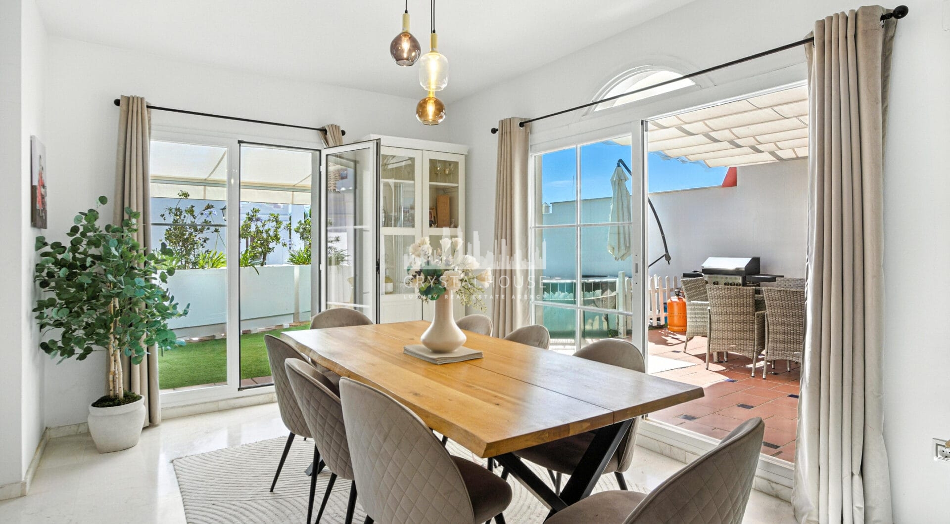Stylish south west facing, three-bedroom semi detached townhouse located in Riviera del Sol