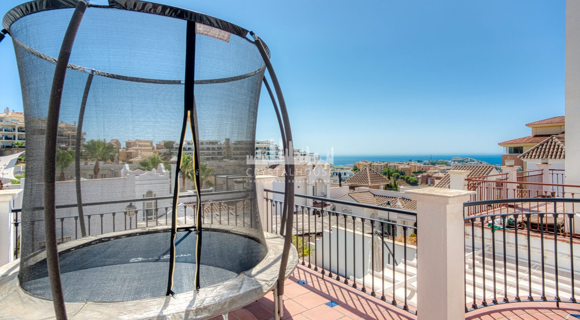 Stylish south west facing, three-bedroom semi detached townhouse located in Riviera del Sol