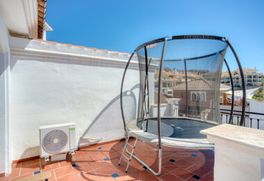 Stylish south west facing, three-bedroom semi detached townhouse located in Riviera del Sol