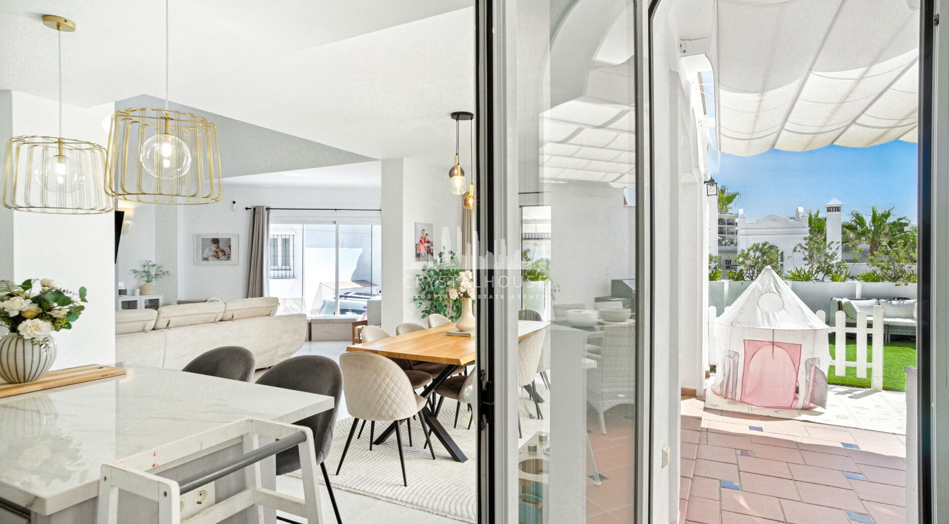 Stylish south west facing, three-bedroom semi detached townhouse located in Riviera del Sol