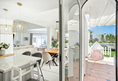 Stylish south west facing, three-bedroom semi detached townhouse located in Riviera del Sol