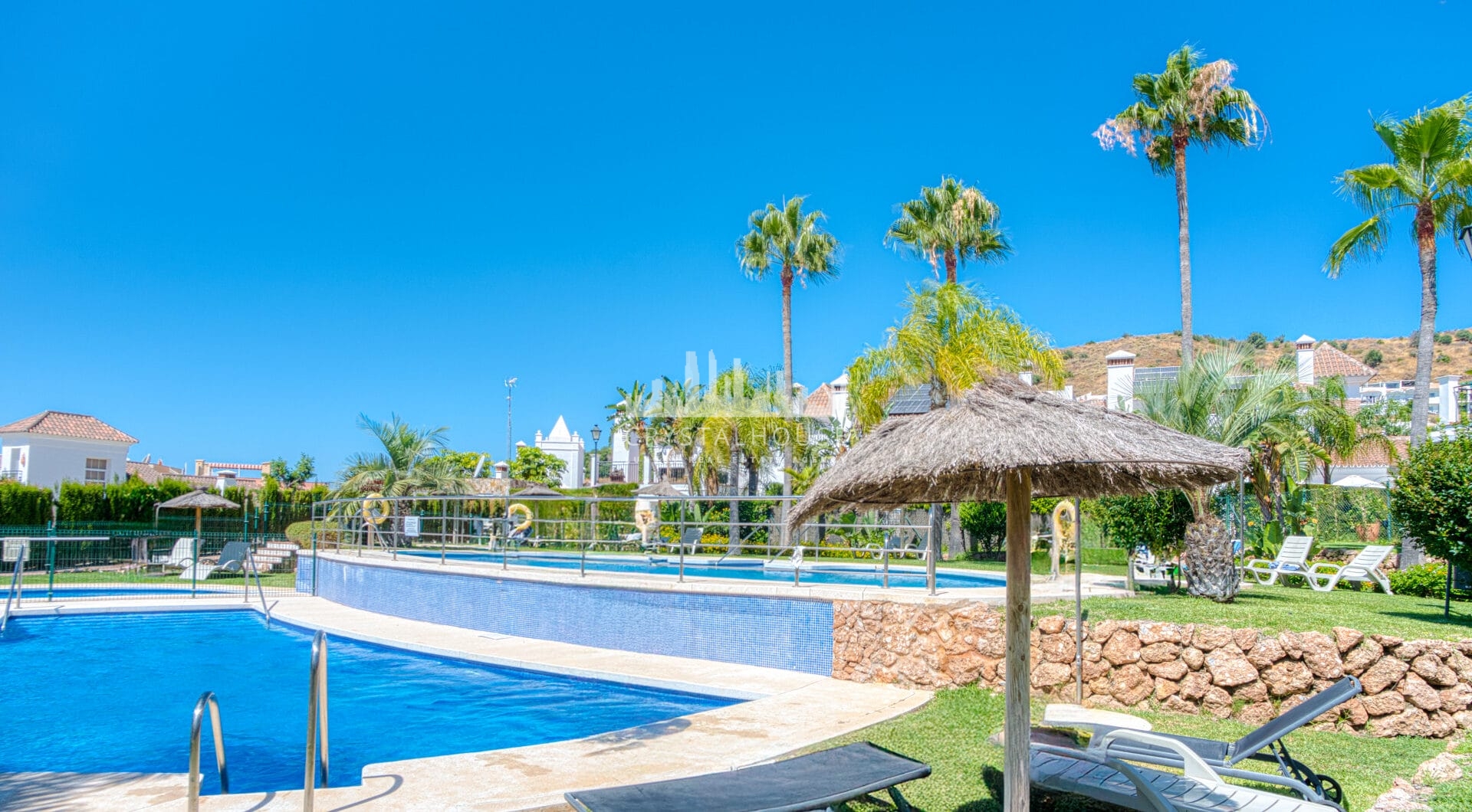 Stylish south west facing, three-bedroom semi detached townhouse located in Riviera del Sol