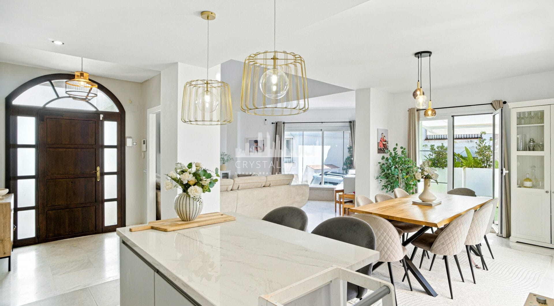 Stylish south west facing, three-bedroom semi detached townhouse located in Riviera del Sol