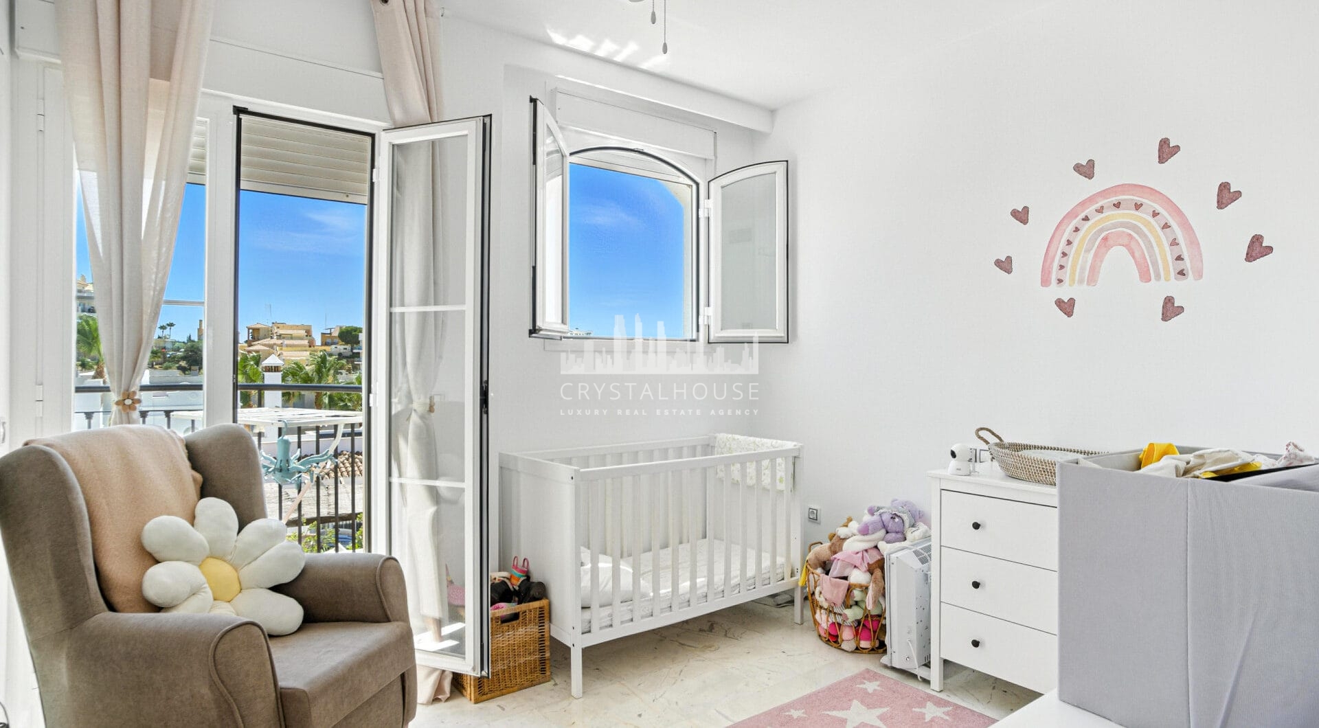 Stylish south west facing, three-bedroom semi detached townhouse located in Riviera del Sol