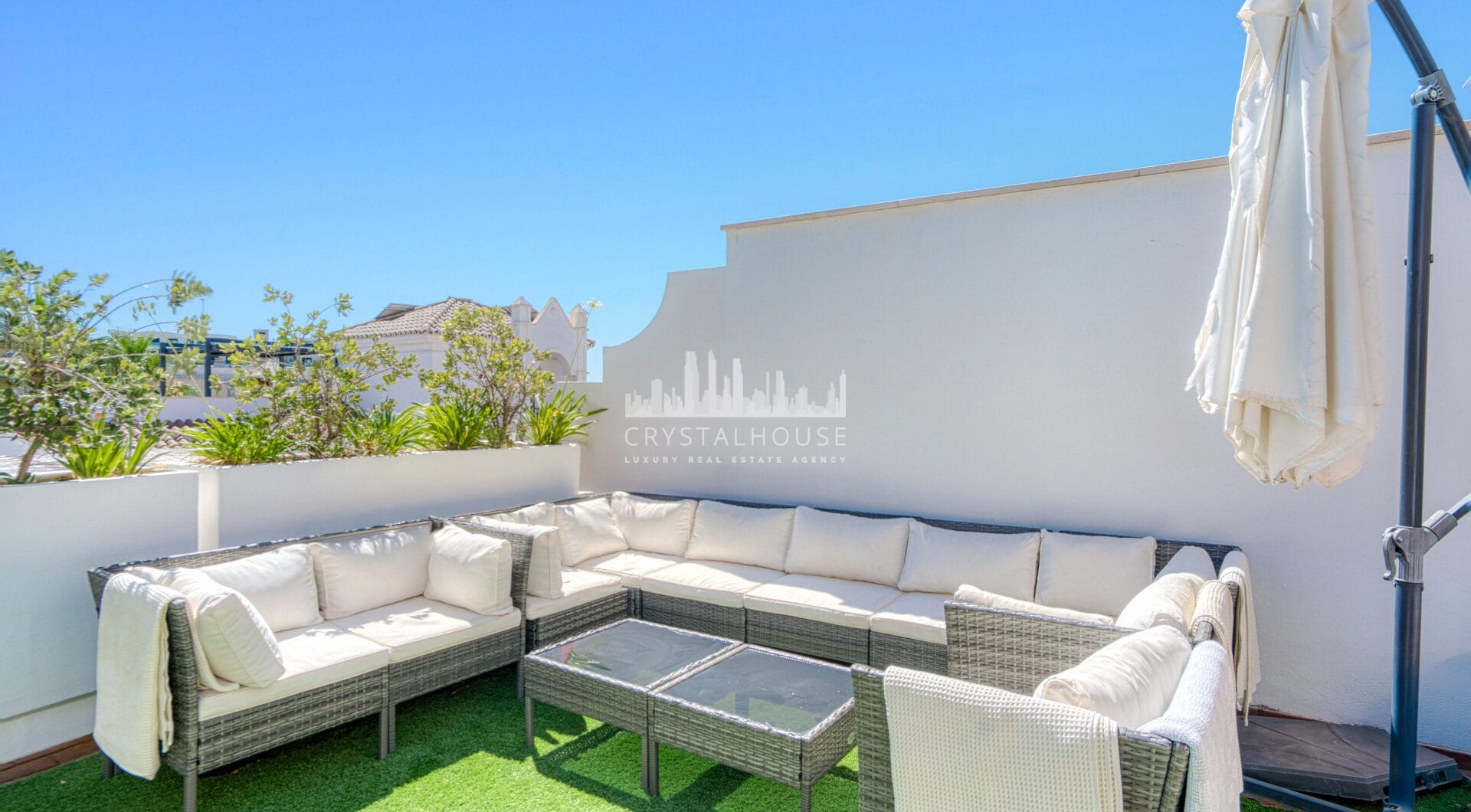 Stylish south west facing, three-bedroom semi detached townhouse located in Riviera del Sol