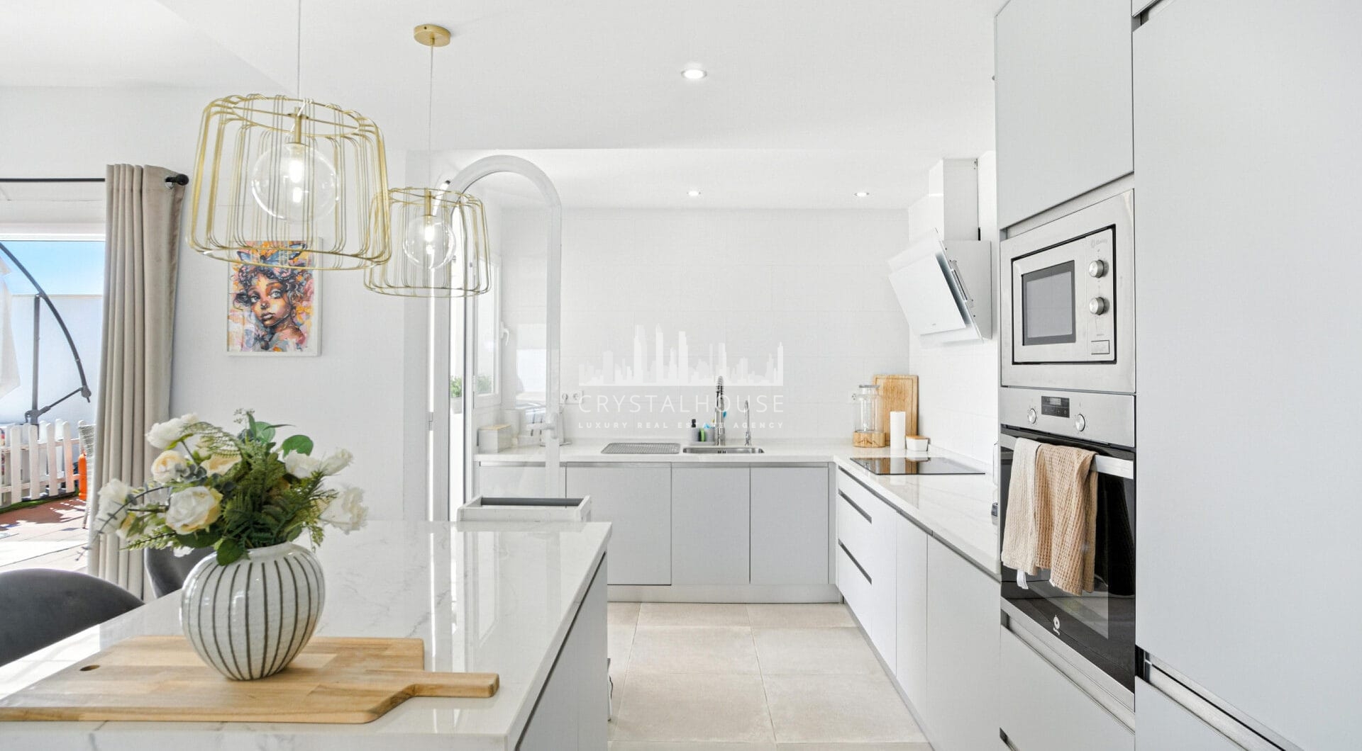 Stylish south west facing, three-bedroom semi detached townhouse located in Riviera del Sol
