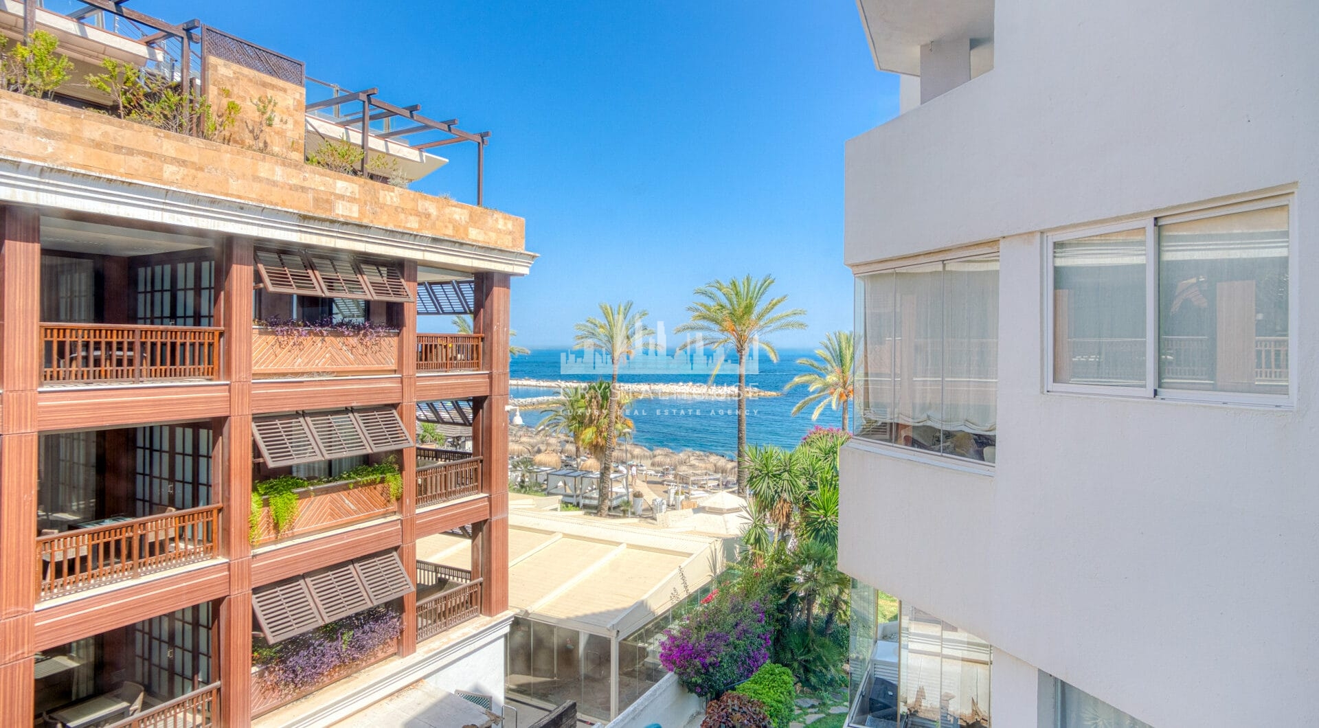 Exclusive Beachfront Two-Bedroom South-Facing Apartment with Sea Views in La Herradura, Marbella