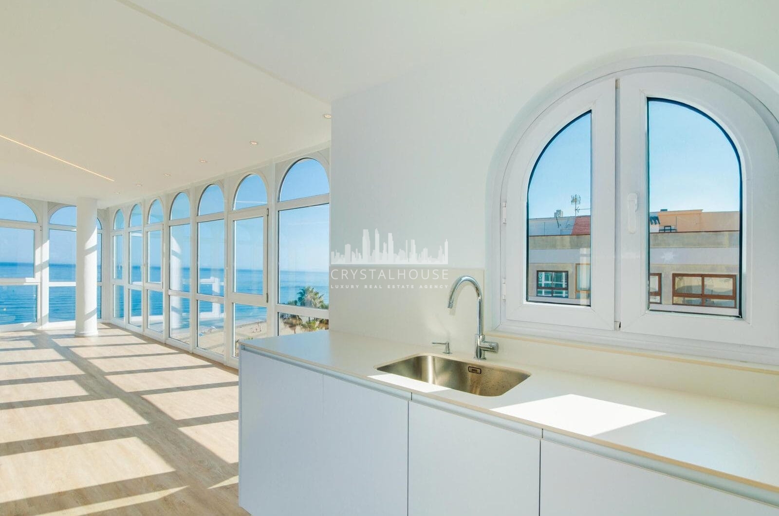 Stunning, south-facing fully renovated, three bedroom beachfront apartment in the heart of Estepona’s charming Old Town