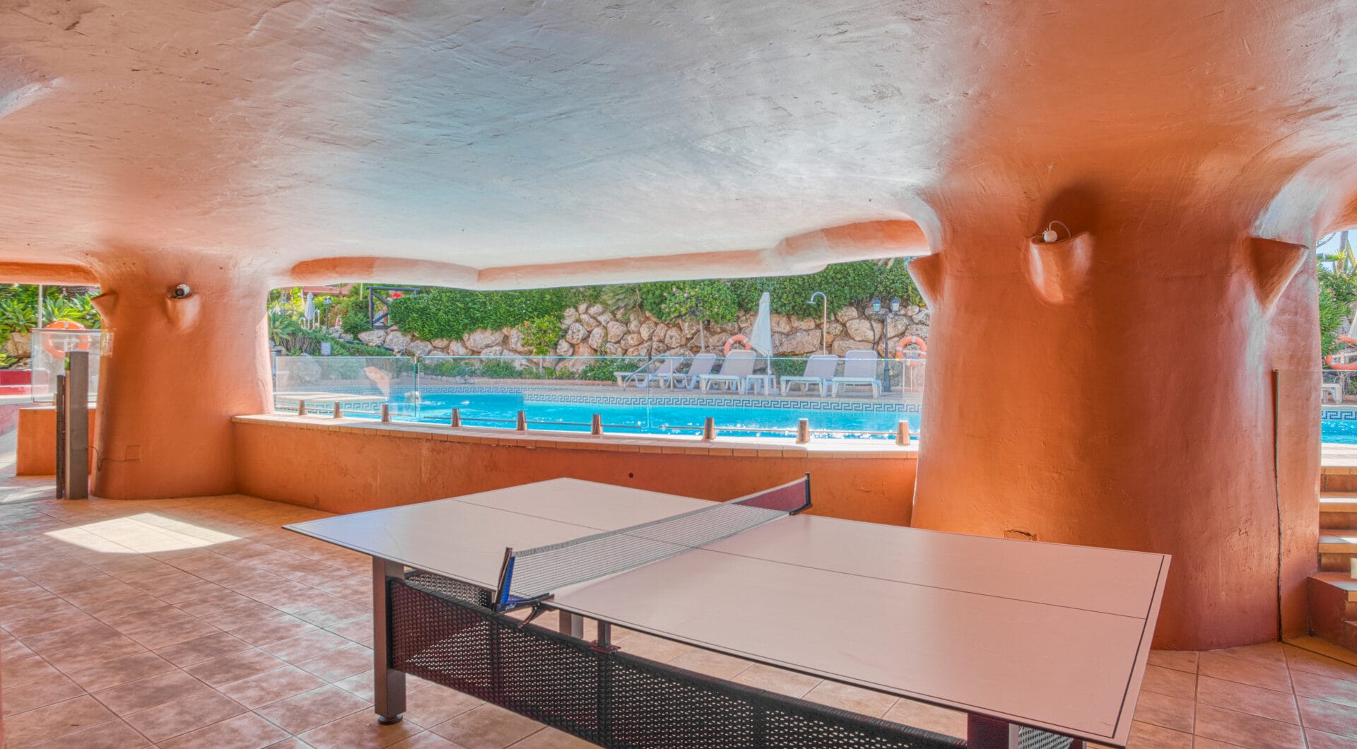 Impeccably renovated, south facing beach front, garden apartment located in the exclusive Menara Beach community on the sought-after New Golden Mile
