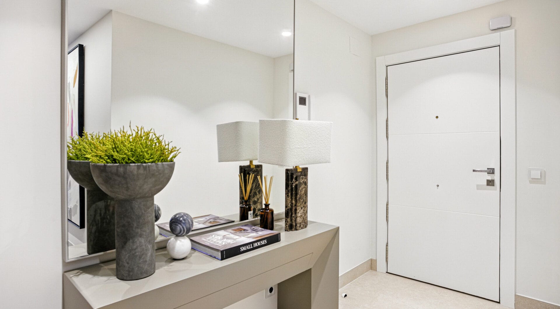 Impeccably renovated, south facing beach front, garden apartment located in the exclusive Menara Beach community on the sought-after New Golden Mile