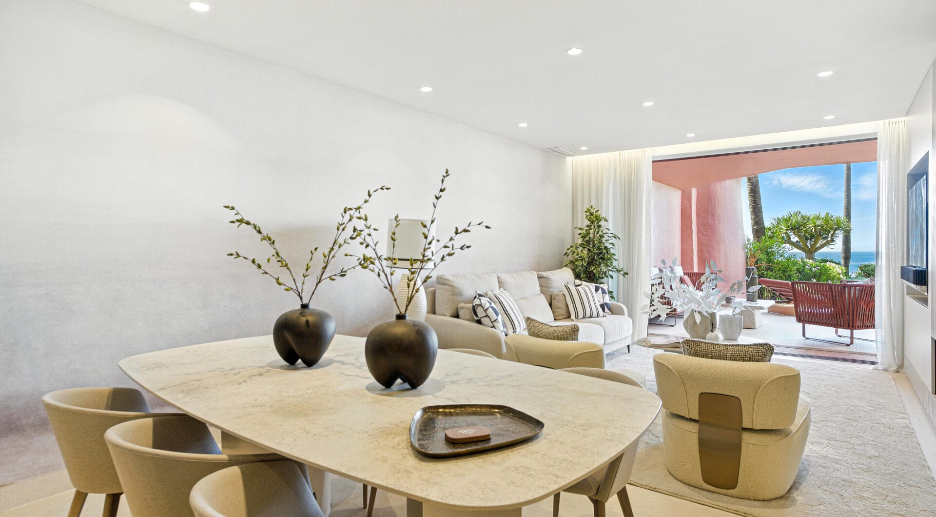 Impeccably renovated, south facing beach front, garden apartment located in the exclusive Menara Beach community on the sought-after New Golden Mile