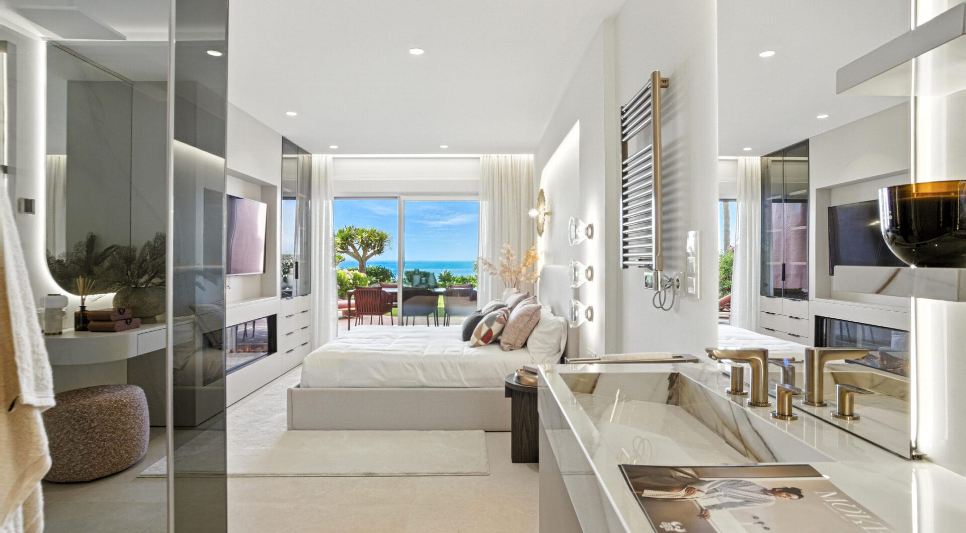 Impeccably renovated, south facing beach front, garden apartment located in the exclusive Menara Beach community on the sought-after New Golden Mile
